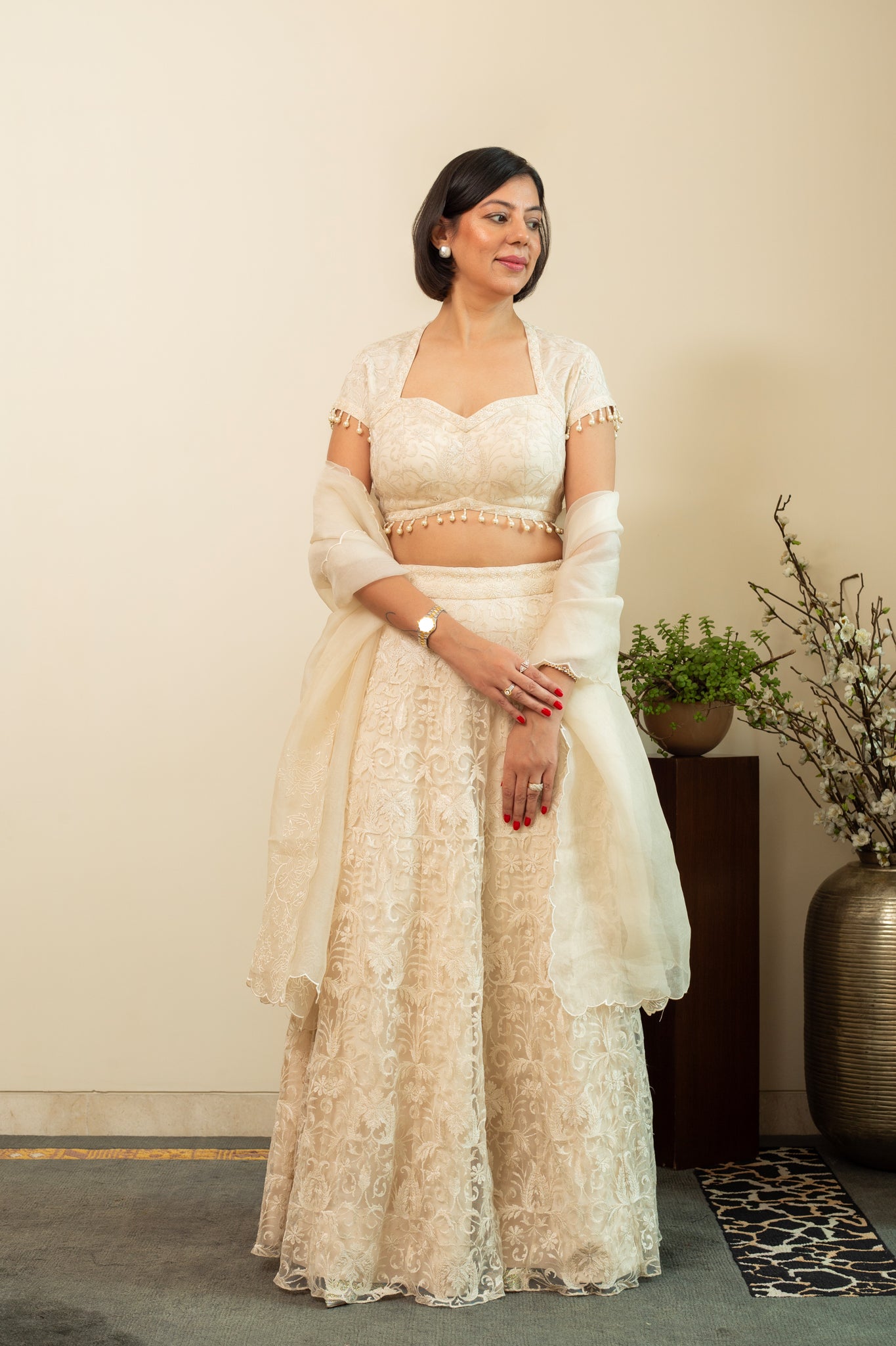 MAHNOOR Ecru Net Lehenga with Jaal Embroidery
